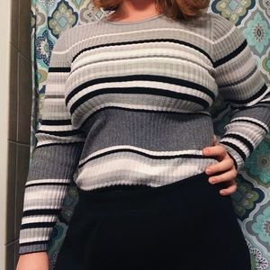 long sleeved black grey white sweater